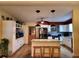 Modern kitchen with granite countertops and white cabinets at 4105 Oak Dr, Winter Haven, FL 33881