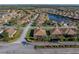 Aerial view showcasing a single-Gathering house in a residential area at 4195 Muirfield Loop, Lake Wales, FL 33859