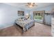 Spacious bedroom with carpeted floors and a ceiling fan at 4195 Muirfield Loop, Lake Wales, FL 33859