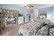 Spacious main bedroom with access to the bathroom and backyard at 4195 Muirfield Loop, Lake Wales, FL 33859
