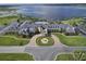 Lake Ashton clubhouse with pool and fountain at 4195 Muirfield Loop, Lake Wales, FL 33859