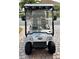Front view of silver golf cart with canopy and windshield at 4195 Muirfield Loop, Lake Wales, FL 33859