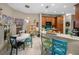 Well-equipped kitchen with an island and breakfast nook at 4195 Muirfield Loop, Lake Wales, FL 33859