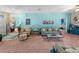 Open living area showcasing comfortable seating and a relaxing atmosphere at 4195 Muirfield Loop, Lake Wales, FL 33859