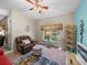 Relaxing living room, leather chair, and decorative rug at 4195 Muirfield Loop, Lake Wales, FL 33859
