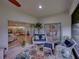 Comfortable screened porch with seating and view at 4195 Muirfield Loop, Lake Wales, FL 33859