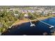 Aerial view of waterfront property with private dock at 462 Sweetwater Way, Haines City, FL 33844