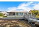 Home features a private dock and backyard at 462 Sweetwater Way, Haines City, FL 33844