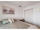 Spacious bedroom with a large bed and ample closet space at 462 Sweetwater Way, Haines City, FL 33844