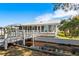 Home with private dock and peaceful canal view at 462 Sweetwater Way, Haines City, FL 33844