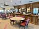 Relaxing bar area with ample seating at 462 Sweetwater Way, Haines City, FL 33844