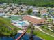 Community center with pool and tennis courts at 462 Sweetwater Way, Haines City, FL 33844