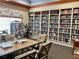 Community library with books and movie selection at 462 Sweetwater Way, Haines City, FL 33844