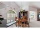 Bright dining area with window looking over water at 462 Sweetwater Way, Haines City, FL 33844