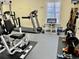 Well-equipped fitness center featuring treadmills and weight machines at 462 Sweetwater Way, Haines City, FL 33844