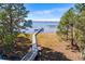 Elevated wooden dock providing access to a serene lake at 462 Sweetwater Way, Haines City, FL 33844