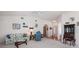 Spacious living room with vaulted ceilings and ample natural light at 462 Sweetwater Way, Haines City, FL 33844
