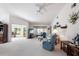 Spacious living room with vaulted ceilings and ample natural light at 462 Sweetwater Way, Haines City, FL 33844