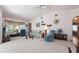 Spacious living room with vaulted ceilings and ample natural light at 462 Sweetwater Way, Haines City, FL 33844