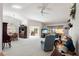 Open and airy living room offering views of the lake at 462 Sweetwater Way, Haines City, FL 33844
