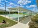 Enjoy a game of shuffleboard under the covered courts at 462 Sweetwater Way, Haines City, FL 33844