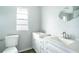 Bathroom with double vanity and updated fixtures at 520 S 10Th St, Lake Wales, FL 33853