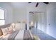 Bedroom with a full-size bed and mirrored closet at 520 S 10Th St, Lake Wales, FL 33853