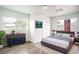 Bedroom with a queen-size bed and wood floors at 520 S 10Th St, Lake Wales, FL 33853
