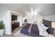 Large bedroom with a king-size bed and built-in shelving at 520 S 10Th St, Lake Wales, FL 33853