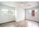 Empty bedroom with wood floors and two windows at 520 S 10Th St, Lake Wales, FL 33853