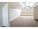 Empty attic bedroom with sloped ceilings at 520 S 10Th St, Lake Wales, FL 33853