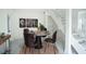 Small dining area with concrete table and four brown chairs at 520 S 10Th St, Lake Wales, FL 33853