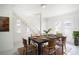 Dining room with a rustic wooden table and six chairs at 520 S 10Th St, Lake Wales, FL 33853