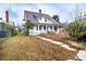 Two-story house with front yard and walkway at 520 S 10Th St, Lake Wales, FL 33853