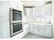 Modern kitchen with stainless steel appliances and white cabinets at 520 S 10Th St, Lake Wales, FL 33853