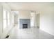 Living room with marble floors and a fireplace at 520 S 10Th St, Lake Wales, FL 33853