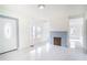 Living room with marble floors and a fireplace at 520 S 10Th St, Lake Wales, FL 33853