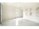 Empty living room with marble-style floors and neutral walls at 520 S 10Th St, Lake Wales, FL 33853