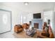 Living room with leather furniture and a fireplace at 520 S 10Th St, Lake Wales, FL 33853