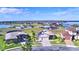Community overview featuring houses near a lake at 537 Pond Cypress Ct, Auburndale, FL 33823