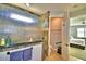 Bathroom with walk-in shower, toilet, and granite vanity at 537 Pond Cypress Ct, Auburndale, FL 33823