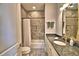 Bathroom featuring a shower/tub combo and granite vanity at 537 Pond Cypress Ct, Auburndale, FL 33823