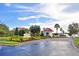 Waterbridge community entrance with gate and landscaping at 537 Pond Cypress Ct, Auburndale, FL 33823