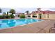 Resort-style pool with adjacent clubhouse at 537 Pond Cypress Ct, Auburndale, FL 33823