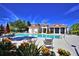 Resort-style community pool with lounge chairs at 537 Pond Cypress Ct, Auburndale, FL 33823