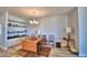 Charming dining room with wooden table and built-in shelving at 537 Pond Cypress Ct, Auburndale, FL 33823