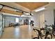 Spacious garage with overhead storage and room for multiple vehicles at 537 Pond Cypress Ct, Auburndale, FL 33823