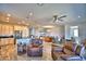 Open concept kitchen with island and stainless steel appliances at 537 Pond Cypress Ct, Auburndale, FL 33823