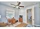 Spacious home office with built-in desk and large window at 537 Pond Cypress Ct, Auburndale, FL 33823