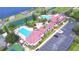 Community pool, clubhouse, and tennis courts at 537 Pond Cypress Ct, Auburndale, FL 33823